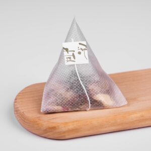 PLA corn fiber non-woven fabric with dot pattern and thread label tea bag